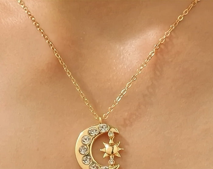 Gold moon and star pendant necklace