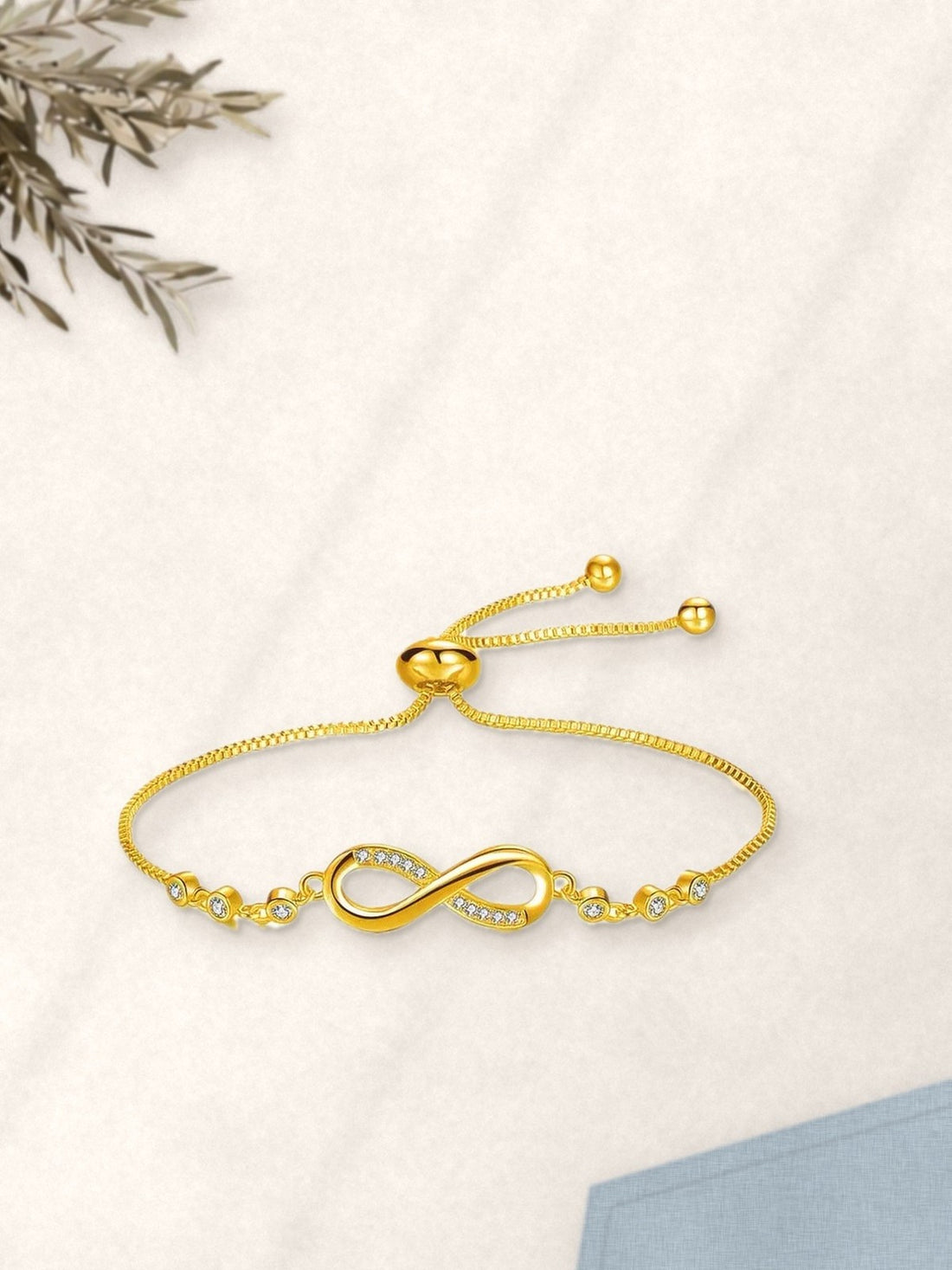 Infinity Gold Adjustable Bracelet laid flat
